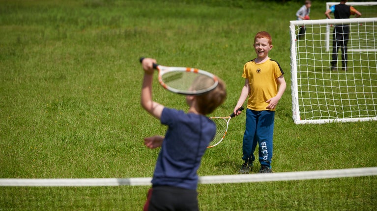 Children playing in a meadow